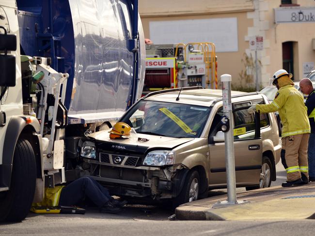 Crash at the intersection of Channon and Duke Street Gympie.  A Nissan X-Trail has tried to over take a turning truck on the inside of the intersection controlled by lights.  Photo Patrick Woods / The Gympie Times