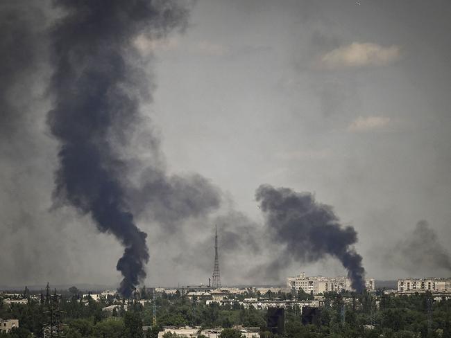 Smoke rises in the city of Severodonetsk during heavy fightings between Ukrainian and Russian troops at eastern Ukrainian region of Donbas on May 30. Picture: AFP