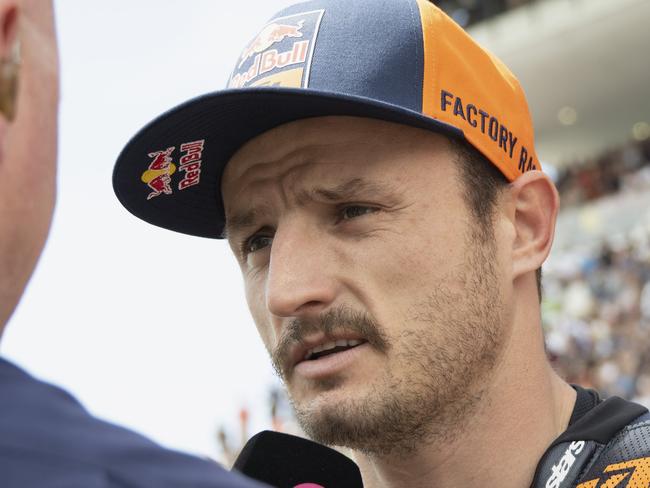 SCARPERIA, ITALY - JUNE 02: Jack Miller of Australia and Bull KTM Factory Racing speaks with journalist and prepares to start on the grid during the MotoGP race during the MotoGP Of Italy - Race at Mugello Circuit on June 02, 2024 in Scarperia, Italy. (Photo by Mirco Lazzari gp/Getty Images)