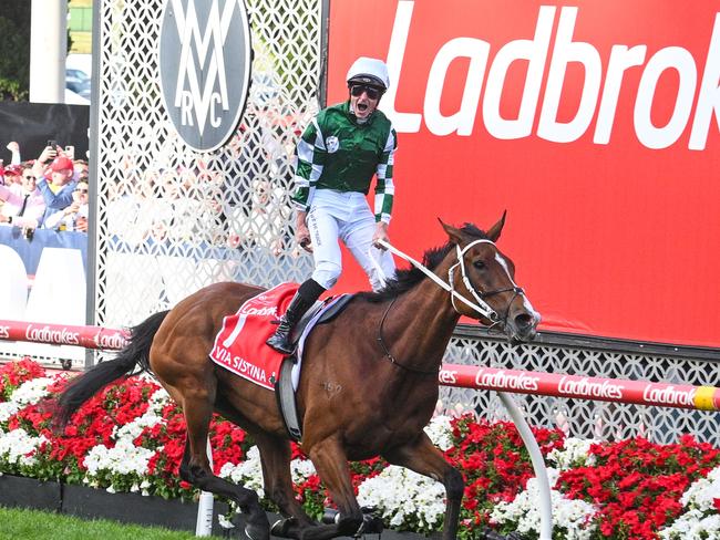 MELBOURNE, AUSTRALIA - OCTOBER 26: James McDonald riding Via Sistina winning Race 9, the Ladbrokes Cox Plate - Betting Odds during Cox Plate Day at Moonee Valley Racecourse on October 26, 2024 in Melbourne, Australia. (Photo by Vince Caligiuri/Getty Images)