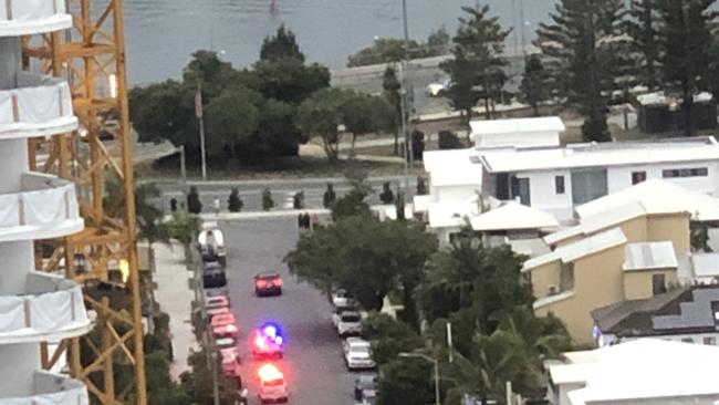 Main Beach street Woodroffe Avenue blocked off as police arrest 10 teens and stop two alleged stolen cars.