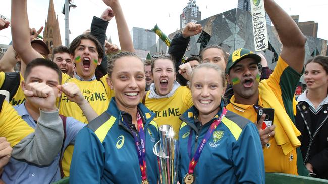 Ashleigh Gardner and Alyssa Healy with a fairly fanatical support crew.