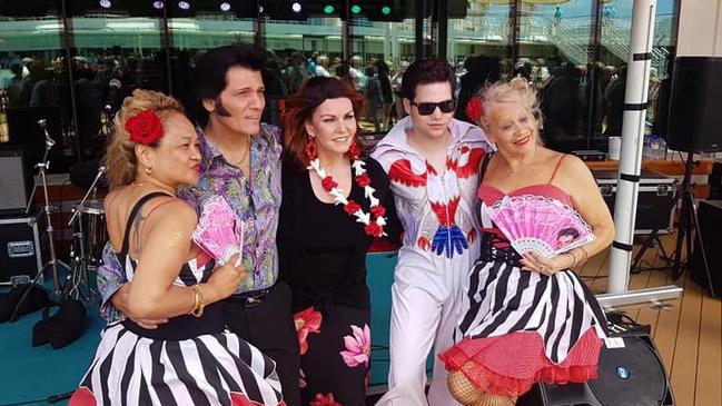 Sen with other Elvis tribute artists on a Sydney cruise boat.