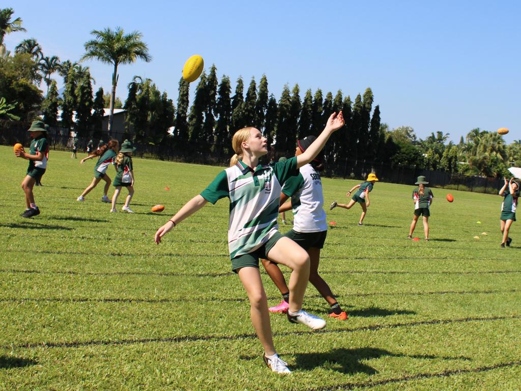 Mega Gallery: Adelaide Crows AFLW stars mix it with Whitfield State School  | The Advertiser