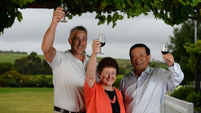 Onkaparinga CEO Mark Dowd with Mayor Lorraine Rosenberg, and magistrate Su Jingwen at the McLaren Vale visitor centre. Picture: Naomi Jellicoe