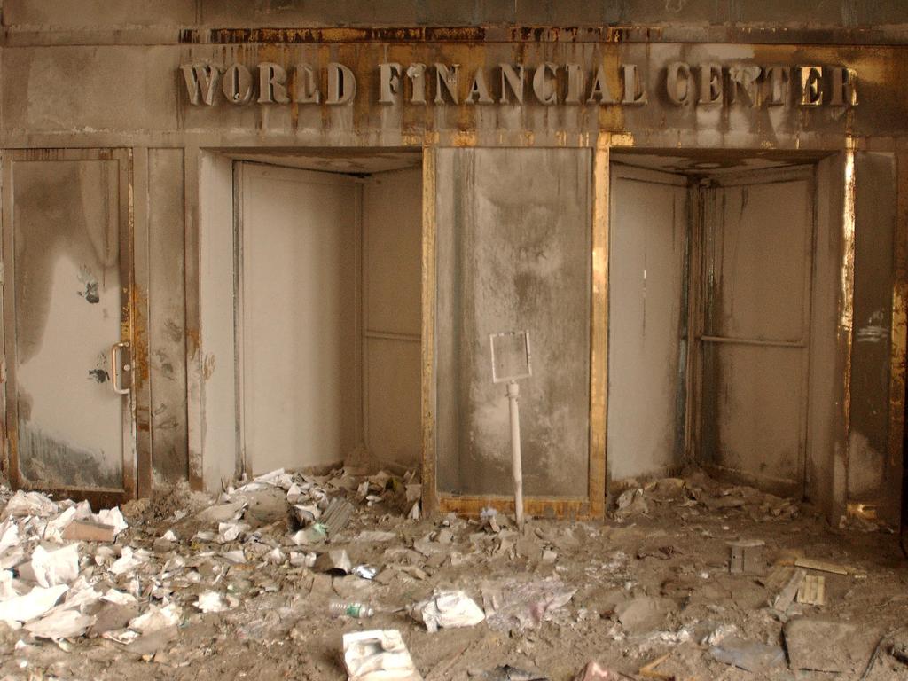 What was once a glittering symbol of the financial centre of the world stood blanketed in ash and soot. Picture: Jim Watson/Alamy