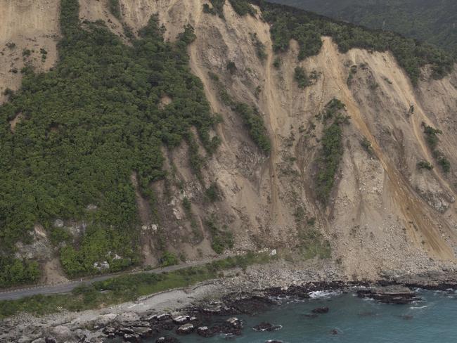 Huge slips, caused by the 7.5 earthquake, are seen blocking State Highway One north of Kaikoura. Picture: Mark Mitchell — Pool/Getty Images.