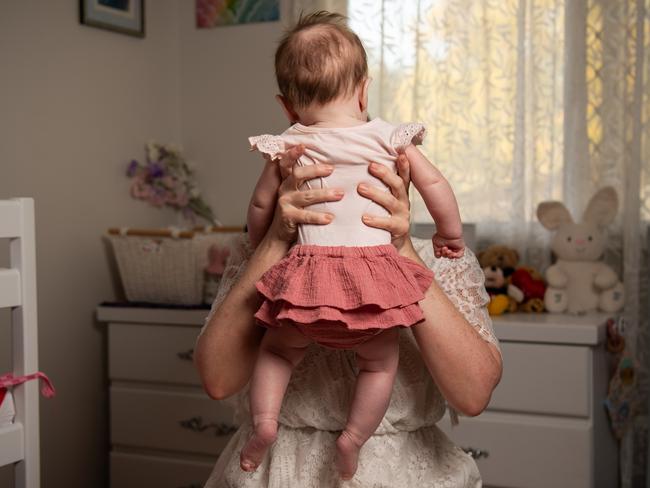 New Palmerston mother Kelsey with her three-month-old Charlotte, the Territory's first locally conceived and delivered surrogate baby. Picture: Pema Tamang Pakhrin