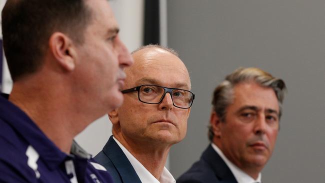 Fremantle coach Ross Lyon addresses the media as club president Dale Alcock and club chief executive Steve Rosich look on. Picture: Getty Images