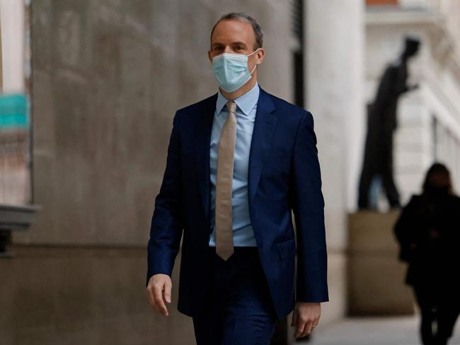 Britain's Justice Secretary and deputy Prime Minister Dominic Raab, wearing a face covering to combat the spread of coronavirus. Picture: Tolga Akmen / AFP