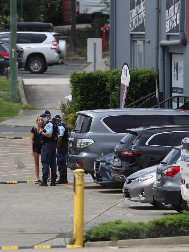 Police investigate the drive-by shooting.