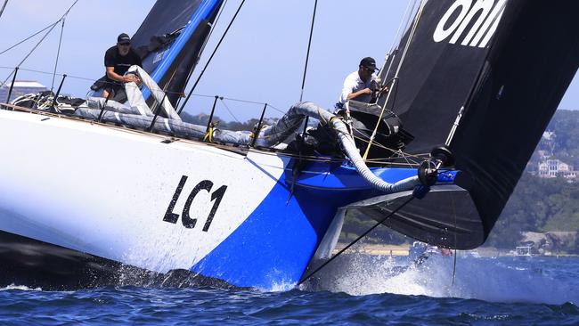 Mitch White runs the bow on the supermaxi LawConnect, one of three 100-footers in the Sydney to Hobart.