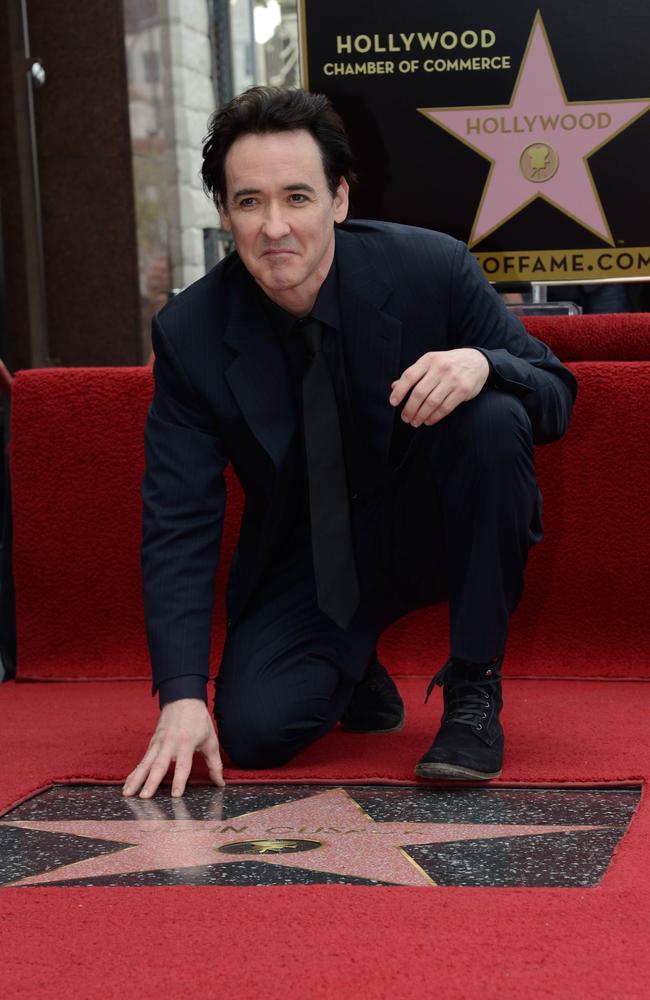 John Cusack reportedly added 35 different women he met on Raya to a WhatsApp group chat in 2019. Picture: AFP