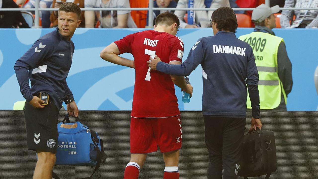 Denmark's midfielder William Kvist leaves the pitch after being injured against Peru. Photo: Jack Guez/AFP
