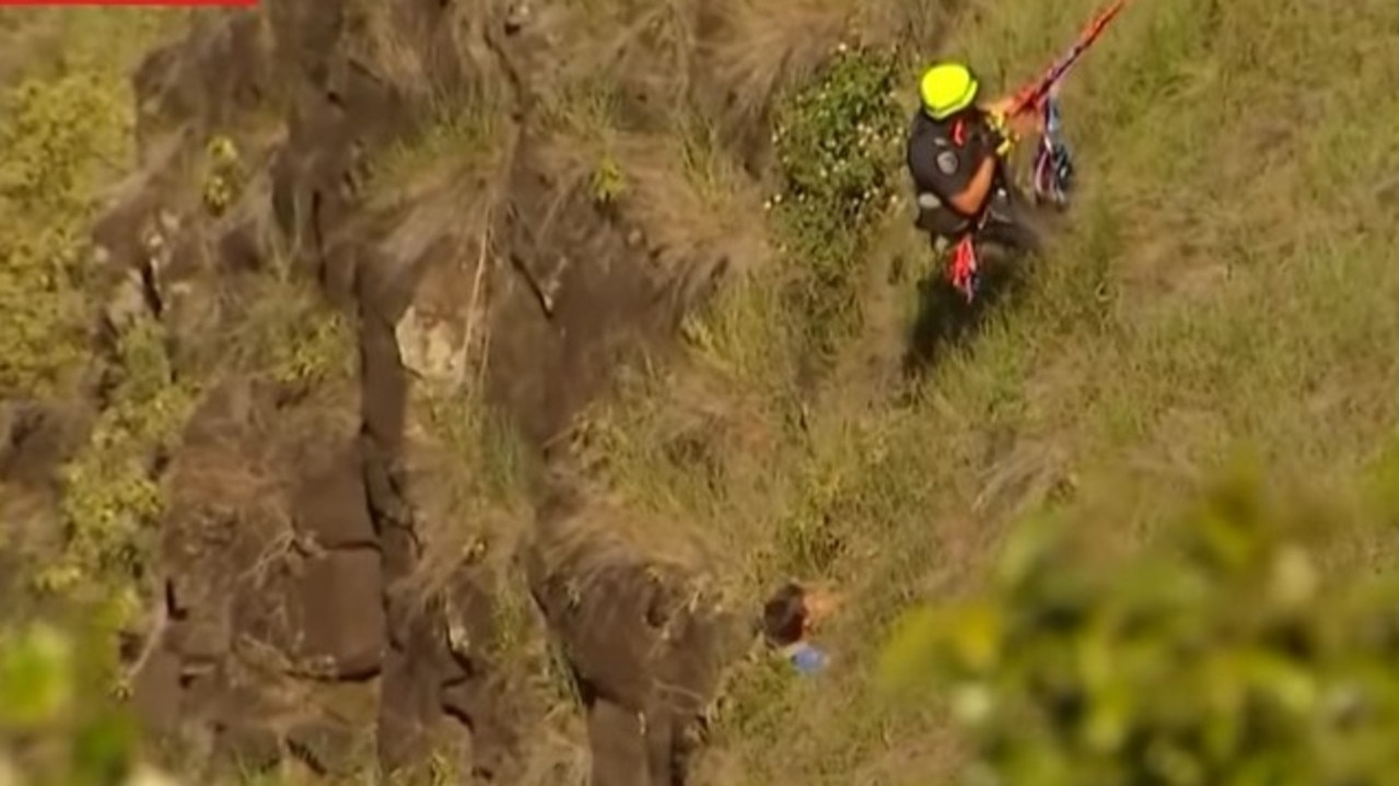 A 19-year-old has been winched to safety after he found himself caught in a precarious position during a Boxing Day climb. Picture: 7 News