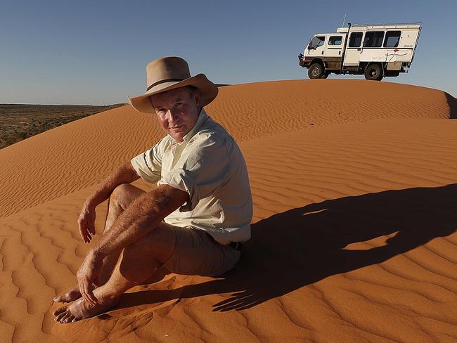 16/12/2018: Martin Josselyn, Birdsville bakery owner and local tour operator, on top of the famous sand dune, Big Red, west of Birdsville. Martin believes the Simpson Desert should remain open year-round to increase tourism, and that tourism in general should be promoted in the summer months. Lyndon Mechielsen/The Australian