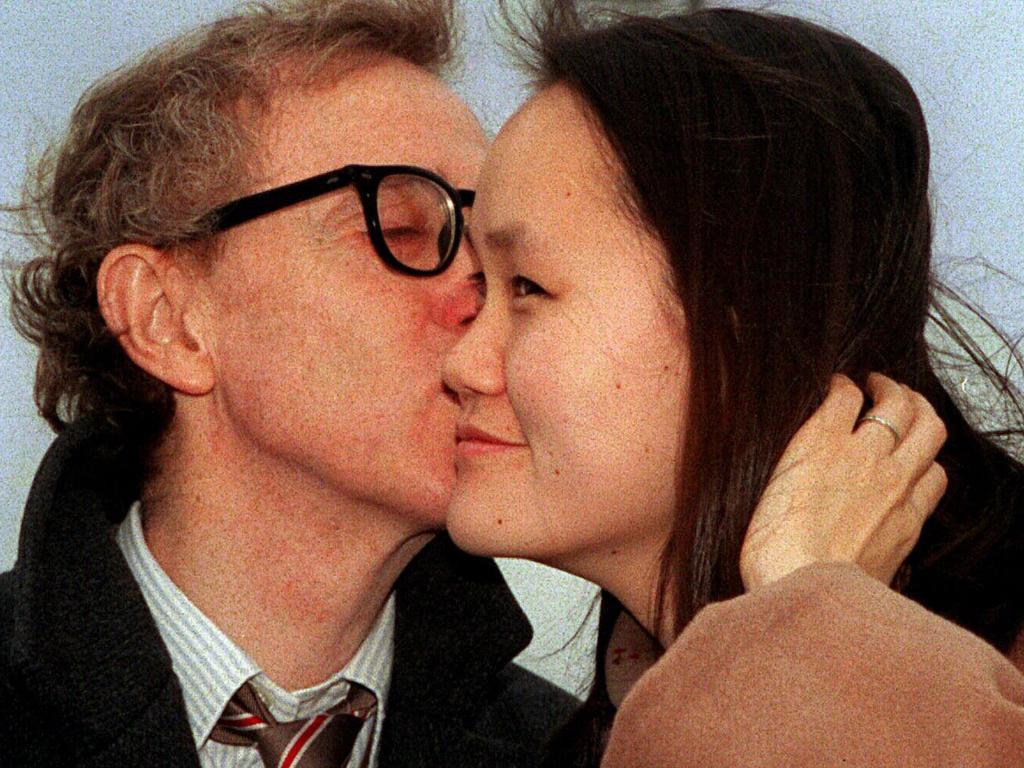 Director Woody Allen kisses his wife Soon-Yi Previn in Paris in 1997. Picture: Supplied