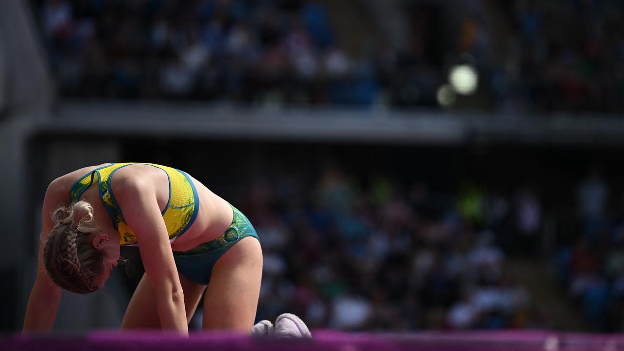 Australia's Eleanor Patterson reacts after the women's high jump final athletics event.  (Photo by Ben Stansall / AFP)