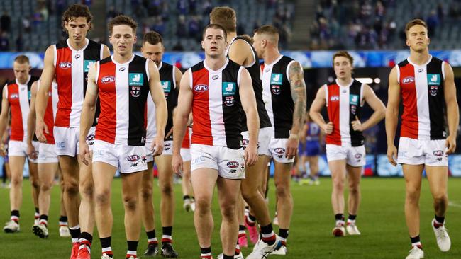 MELBOURNE, AUSTRALIA - MAY 22: The Saints look dejected after a loss during the 2021 AFL Round 10 match between the Western Bulldogs and the St Kilda Saints at Marvel Stadium on May 22, 2021 in Melbourne, Australia. (Photo by Michael Willson/AFL Photos via Getty Images)