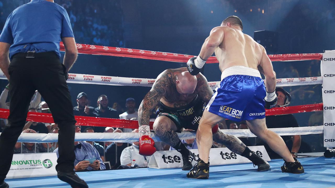 WOLLONGONG, AUSTRALIA - APRIL 21: Paul Gallen punches Lucas Browne during their bout at WIN Entertainment Centre on April 21, 2021 in Wollongong, Australia. (Photo by Mark Metcalfe/Getty Images)