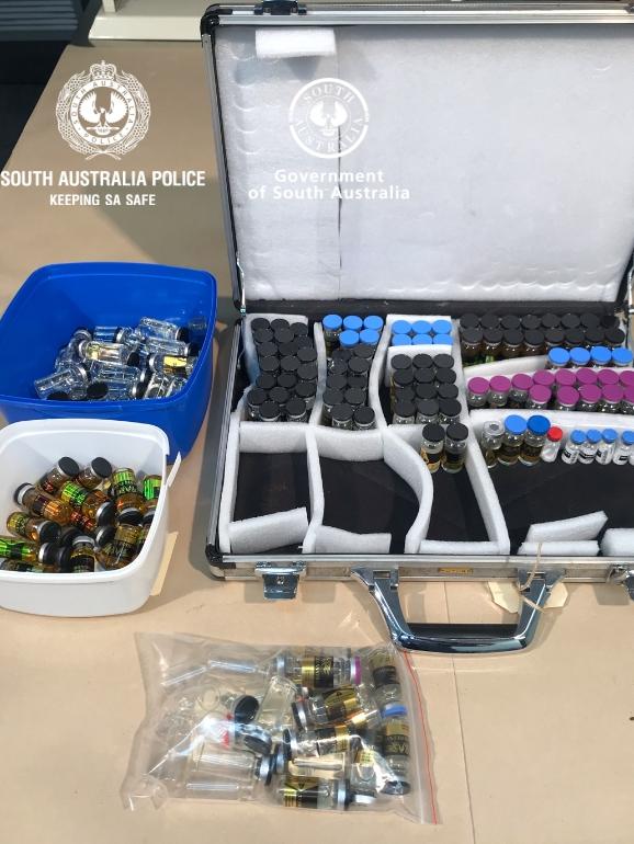 Police seized more than 300,000 steroid tablets, liquid anabolic steroids and a pill press from the property. Picture: SA Police