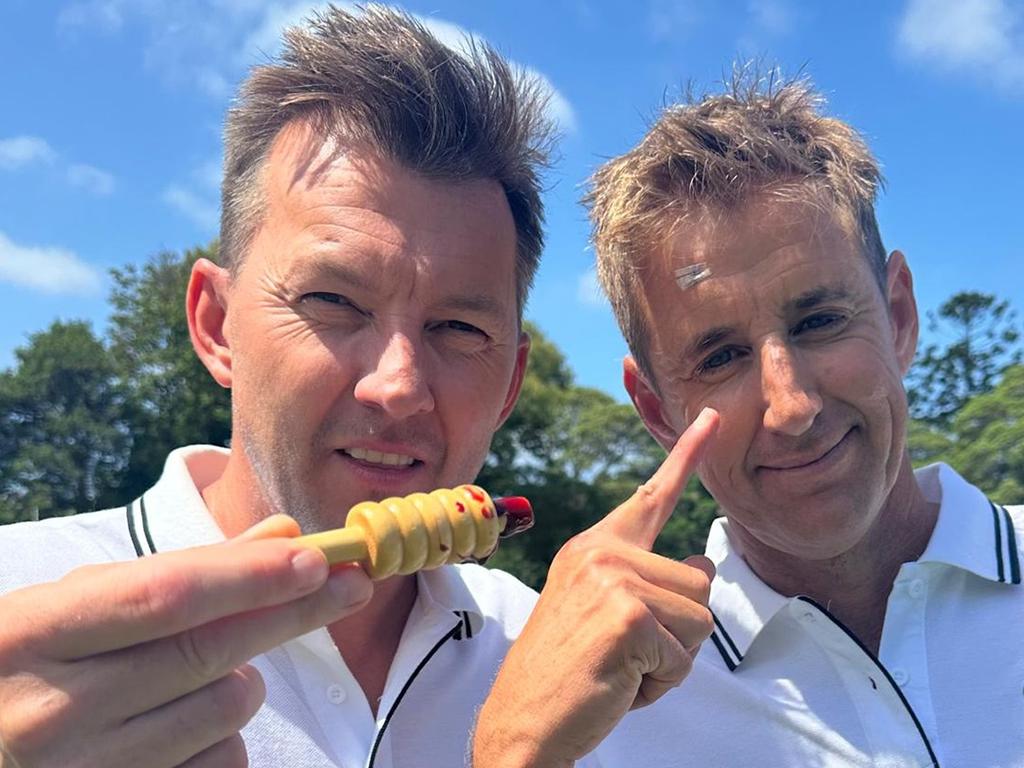 Brett Lee holds the bail which collected Mark Howard, and left the presenter needing stitches. Picture: Kayo Sports