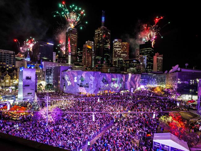 Huge crowds watched the fireworks from Federation Square. Picture: Nicole Cleary