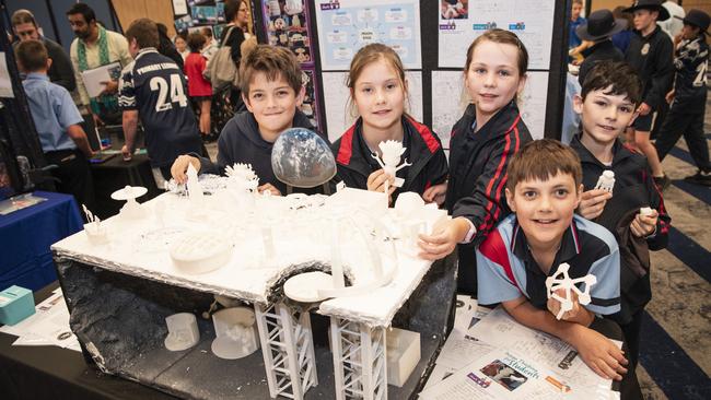 Meringandan State School students (from left) Beau Sharp, Halle Krug, Amalia Lablack, Harrison Wittig and Eamonn Brummel (absent is Levi Holden) with their moon base display in Kids in Space Queensland finals and showcase at Edmund Rice Cultural Centre St Mary's College, Friday, June 7, 2024. Picture: Kevin Farmer