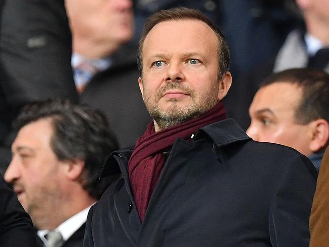 (FILES) In this file photo taken on January 29, 2020 Manchester United's executive vice-chairman Ed Woodward reacts ahead of the English League Cup semi-final second leg football match between Manchester City and Manchester United at the Etihad Stadium in Manchester, north west England. - Manchester United's executive vice-chairman Ed Woodward announced on April 20, 2021, that he would be resigning from his position at the end of 2021, British media reported. (Photo by Paul ELLIS / AFP) / RESTRICTED TO EDITORIAL USE. No use with unauthorized audio, video, data, fixture lists, club/league logos or 'live' services. Online in-match use limited to 120 images. An additional 40 images may be used in extra time. No video emulation. Social media in-match use limited to 120 images. An additional 40 images may be used in extra time. No use in betting publications, games or single club/league/player publications. /