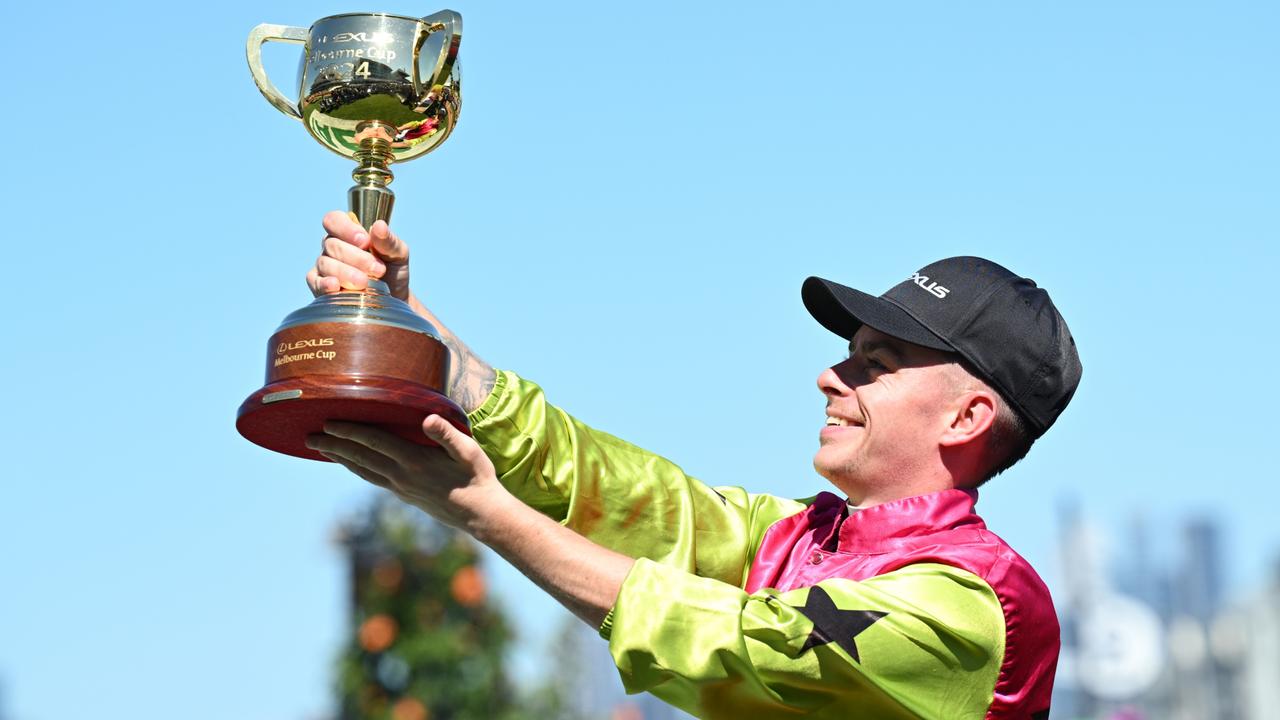 Robbie Dolan shows off the Melbourne Cup after his win with Knight’s Choice. Picture: Getty Images