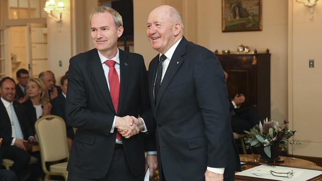 Governor-General Sir Peter Cosgrove with Minister for Immigrations David Coleman during Mr Coleman’s swearing in at Government House in Canberra on May 29. Picture Lukas Coch