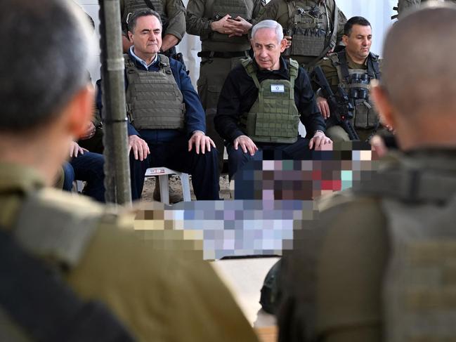 Israeli Prime Minister Benjamin Netanyahu, centre, and Defence Minister Israel Katz, left, during a visit to the northern Gaza Strip in April. Picture: AFP