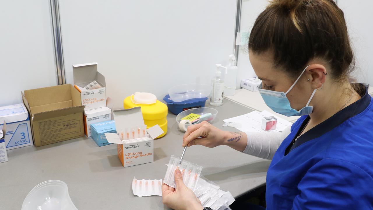 By the end of May 2022, 17.5 million Australians will be eligible for a third jab. Picture: NCA NewsWire / David Crosling