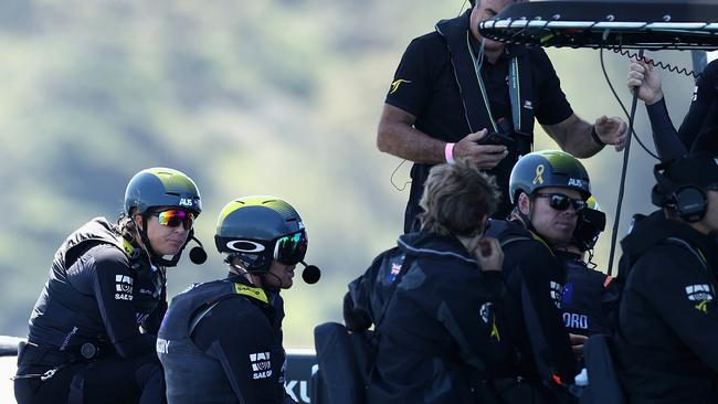 Tom Slingsby and Australia SailGP team talk during a practice session ahead of SailGP on Sydney Harbour on December 15, 2021 in Sydney, Australia. (Photo by Cameron Spencer/Getty Images)