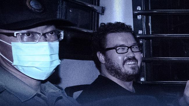 British banker Rurik Jutting (R) pictured in November 2014. Picture: AFP PHOTO / Philippe LOPEZ
