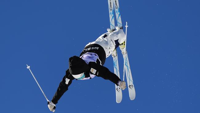 Britt Cox soars during the women’s moguls competition in Sierra Nevada, Spain.