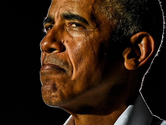 Former US President Barack Obama speaks at a drive-in rally as he campaigns for Democratic presidential candidate former Vice President Joe Biden in Miami, Florida on November 2, 2020. (Photo by CHANDAN KHANNA / AFP)