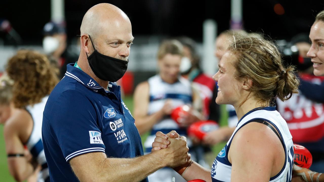 Geelong coach Dan Lowther with player Chloe Scheer.