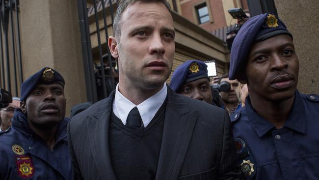 Oscar Pistorius leaves court after his sentence was increased in 2016. Photo by Charlie Shoemaker/Getty Images.