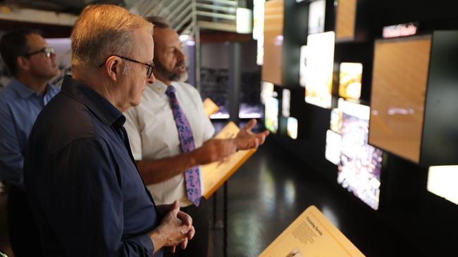 Prime Minister Anthony Albanese given a tour through the MAGNT Cyclone Tracy exhibition by Territory historian Jared Archibald on December 24, 2024. Picture: Sam Lowe