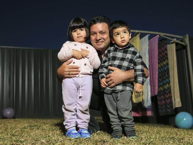 Javier Borello with his children Samuel, two, and Olivia, three. Picture: Dylan Robinson.