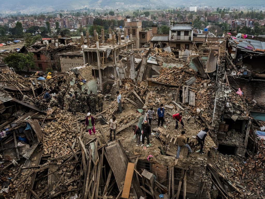 “An earthquake’s Aftermath, Nepal” by photographer Daniel Berehulak for The New York Times which won third prize in the General News stories category shows residents foraging through their destroyed homes, gathering salvageable belongings. Bhaktapur, Nepal, April 29, 2015.(Daniel Berehulak/The New York Times, World Press Photo via AP)