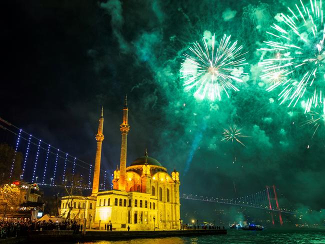 Fireworks explode in the sky over the Ortakoy Mosque by the July 15 Martyrs' Bridge during the New Year's celebrations, in Istanbul on January 1, 2020. Picture: AFP