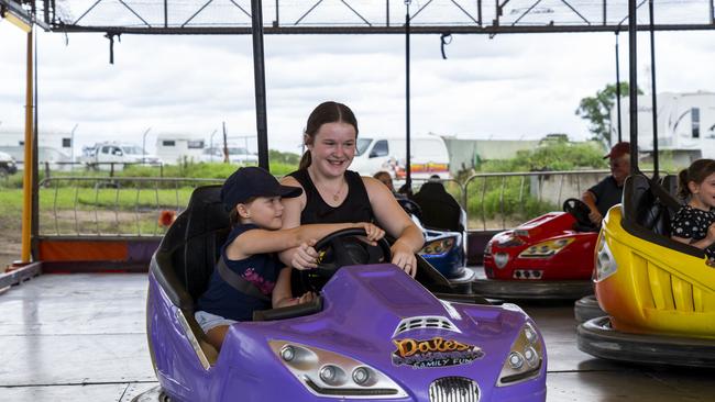 Two show goers enjoy the bumper cars. Picture: AAP/Matthew Vasilescu