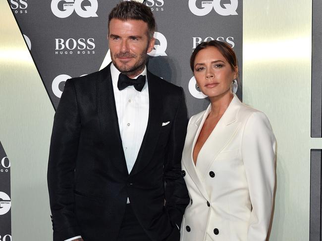 Victoria Beckham, pictured with husband David Beckham at GQ Men Of The Year Awards 2019 this month, has just launched her own beauty line. Picture: Getty