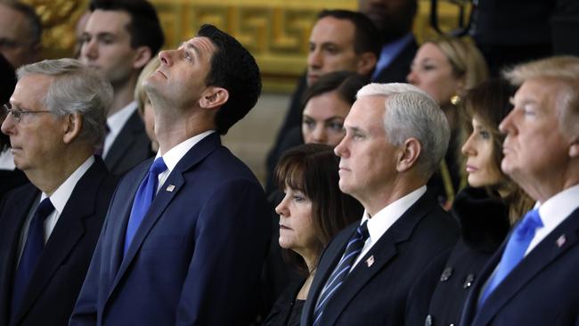 Mitch McConnell, Paul Ryan, Karen Pence, Vice President Mike Pence, Melania Trump and President Donald Trump, at the ceremony. Picture: AP