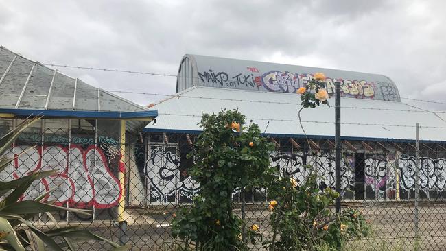 The site of the former Garden Sheds Galore Burwood East has become graffitied with windows smashed in.