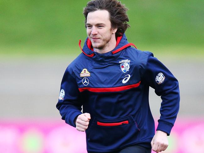 MELBOURNE, AUSTRALIA - JULY 10:  Liam Picken of the Bulldogs, out with concussion for this season so far, runs during a Western Bulldogs AFL media opportunity at Whitten Oval on July 10, 2018 in Melbourne, Australia.  (Photo by Michael Dodge/Getty Images)