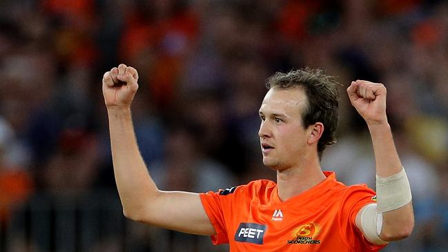 Joel Paris of the Scorchers celebrates after dismissing Ben Cutting of the Heat during the Big Bash League (BBL) cricket match between the Perth Scorchers and the Brisbane Heat at Optus Stadium in Perth, Saturday, January 11, 2020. (AAP Image/Richard Wainwright)