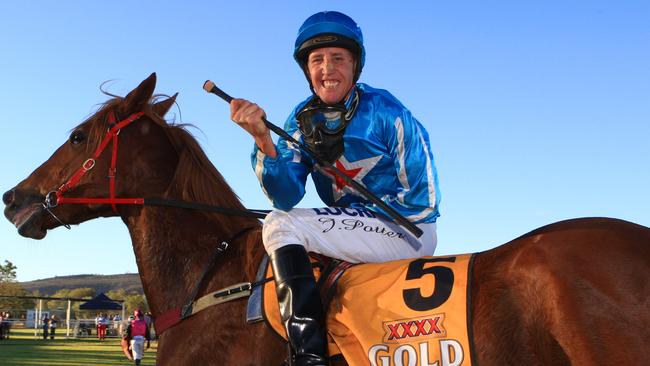 A jubilant Justin Potter aboard Pretty Blonde after winning the Alice Springs Cup...Picture: Phil Williams